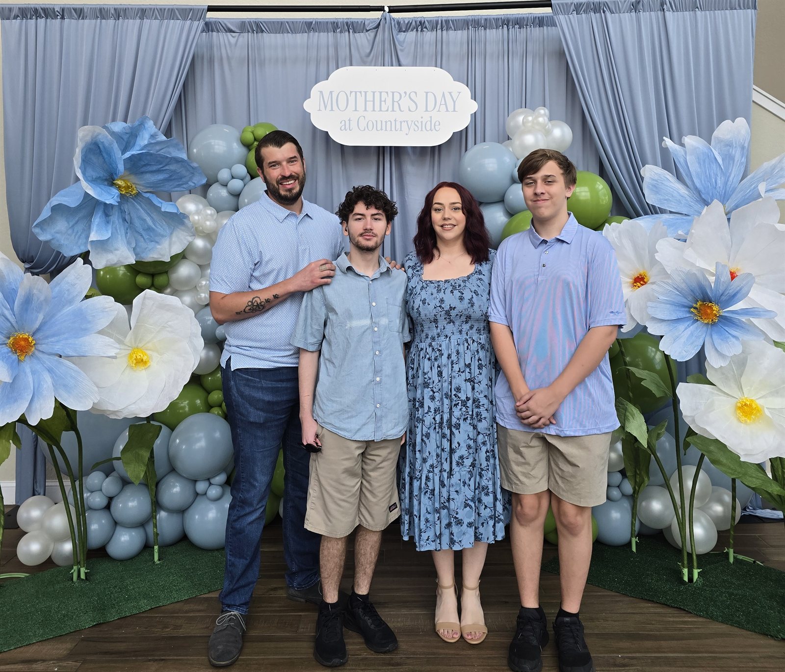Greg, Amber, and their two sons at a Mother's Day event at Countryside Christian Church.